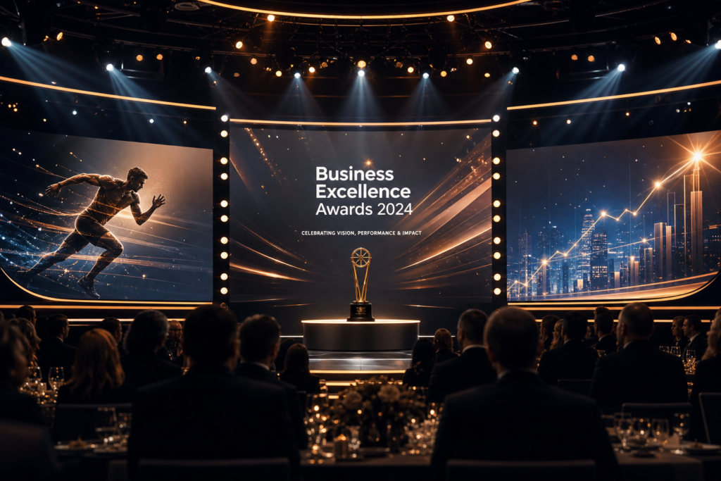 Elegant sports business awards ceremony stage with dramatic lighting and a gleaming trophy at the podium